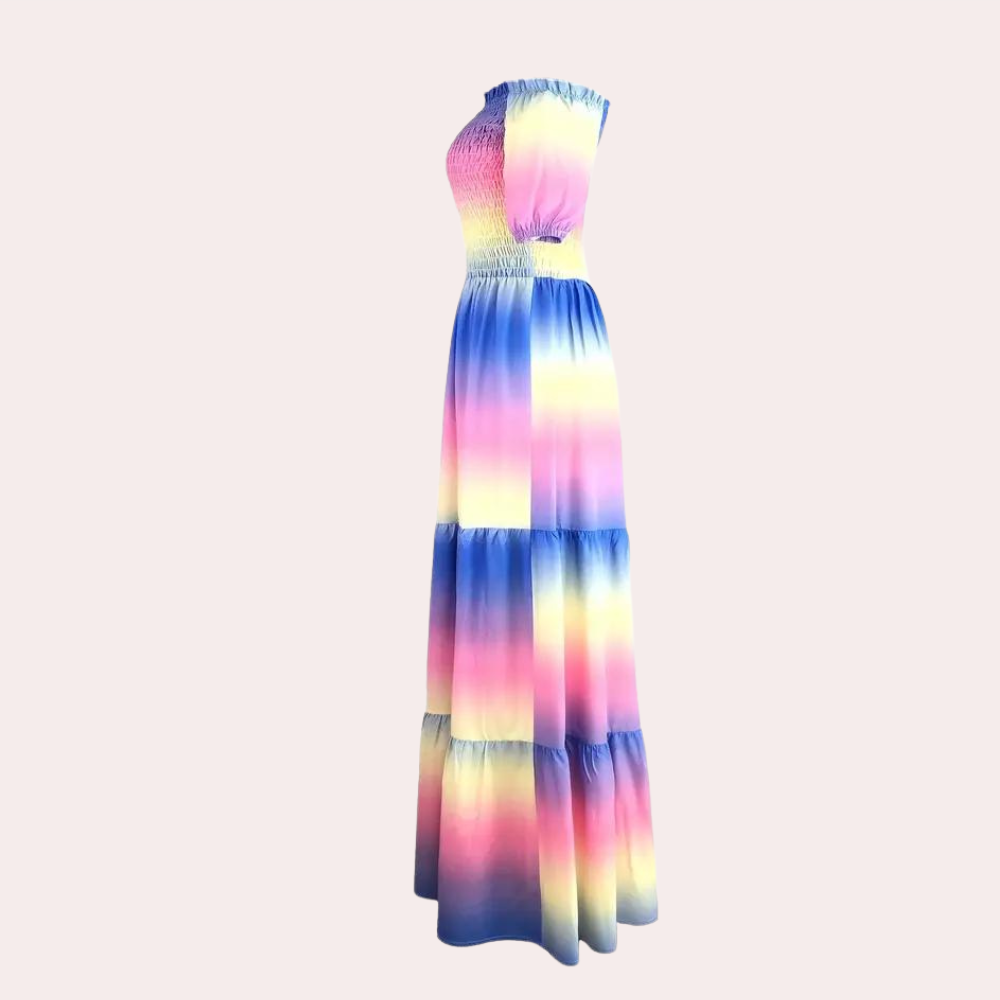 Feminine Noémie off-shoulder layered summer dress, a versatile midi dress with an elegant silhouette.