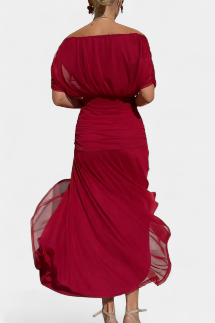Sophisticated women's elegant maxi dress, featuring an off-shoulder neckline and flattering draped design for evening.