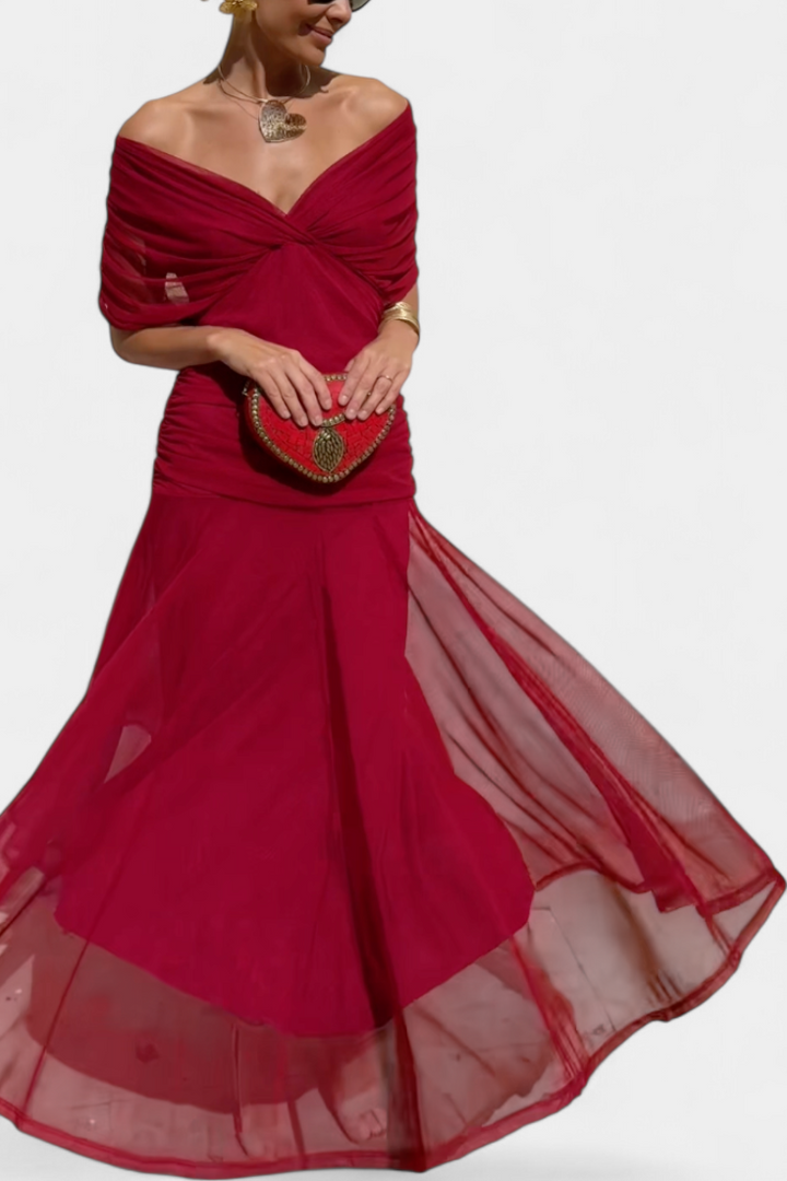 Beautiful off-shoulder long dress for women, an elegant maxi gown perfect for formal occasions or special events.