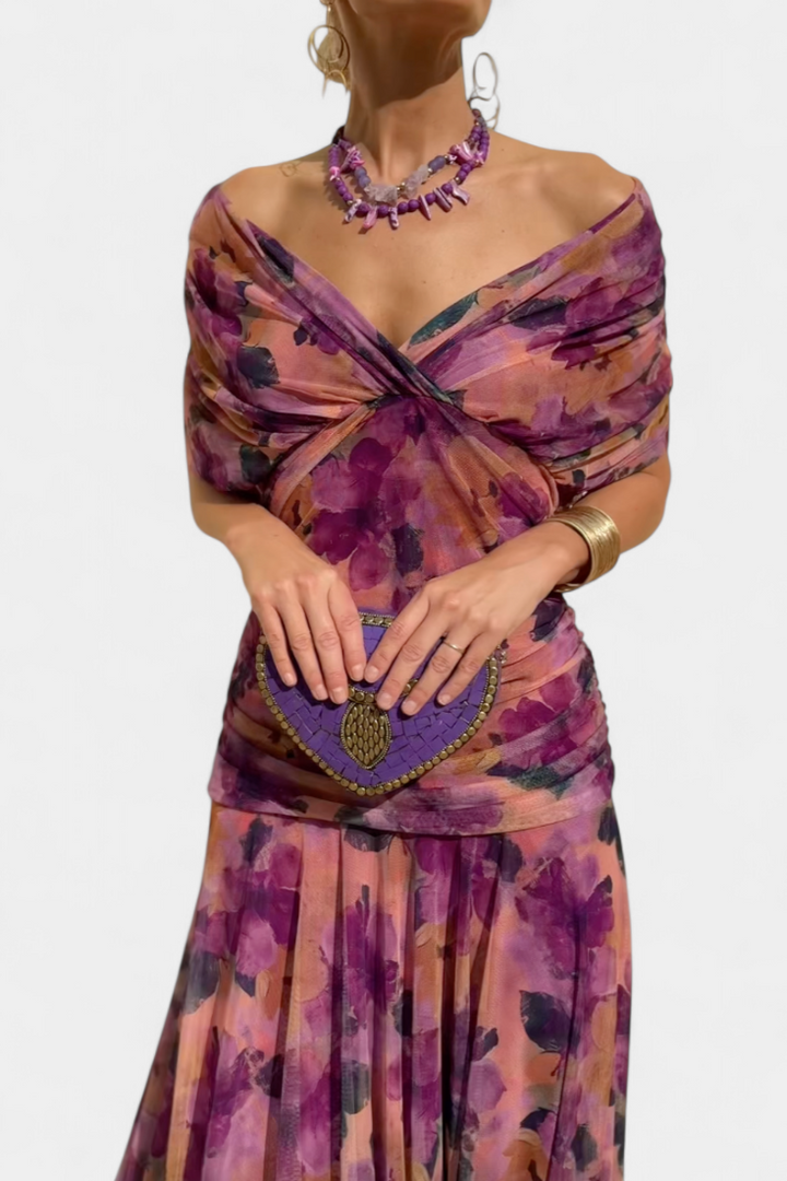 Flattering off-shoulder maxi dress for women, ideal for special occasion wear. Elegant and comfortable long gown.
