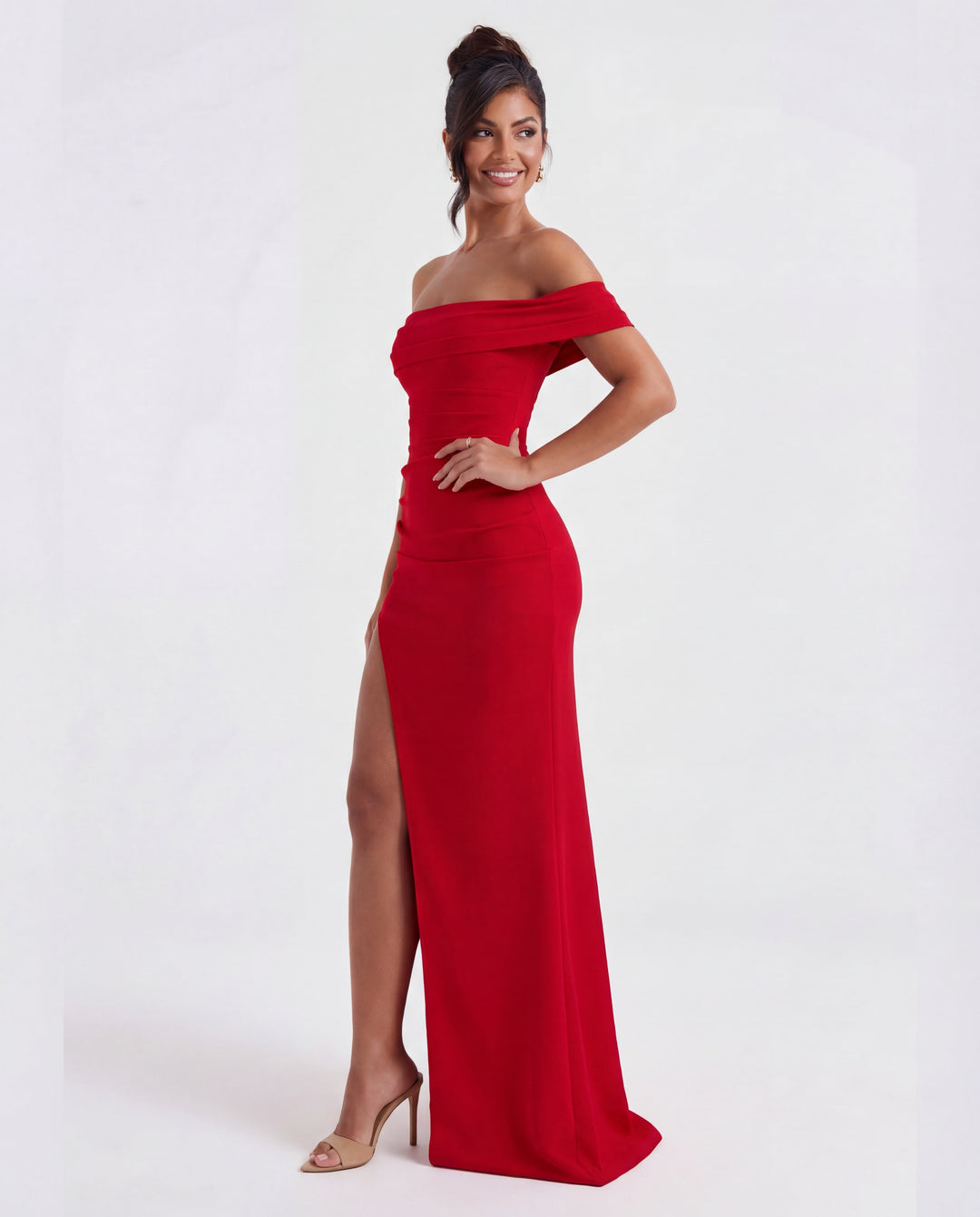 Formal women's off-shoulder maxi dress with flattering ruched bodycon silhouette.