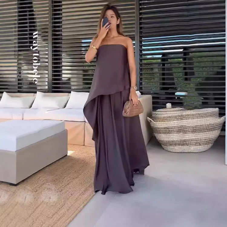 Coordinated women's elegant two-piece set featuring an off-shoulder top and comfortable maxi skirt for summer.