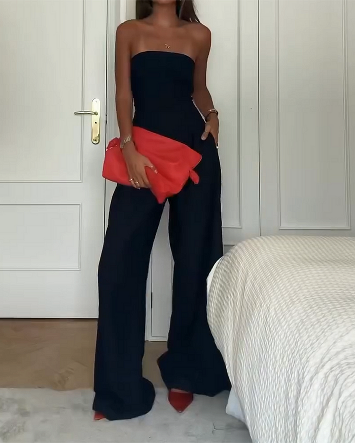 Comfortable and elegant women's off-shoulder wide-leg jumpsuit in a sleek black fabric.