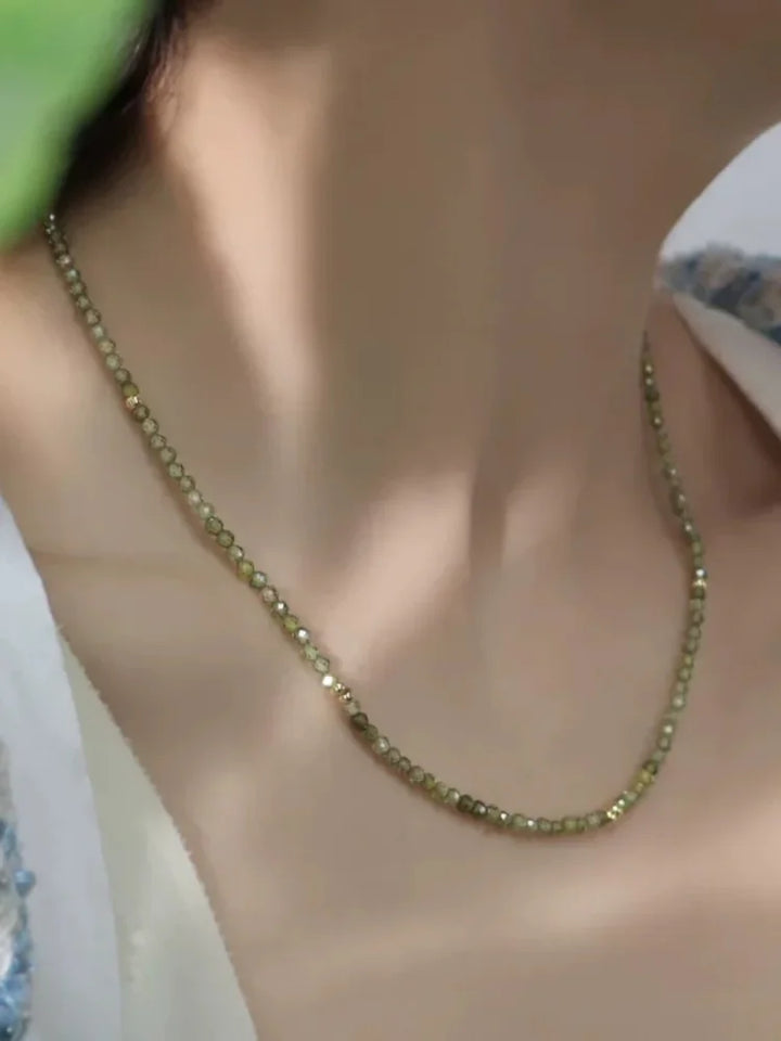 Sparkling olive green zirconia necklace for women, gold-plated, elegant and a perfect jewelry gift.