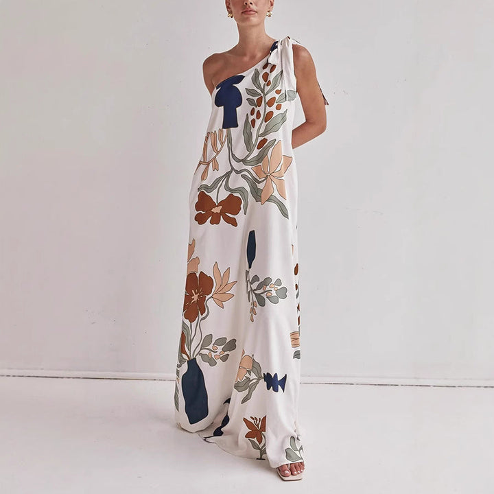 Elegant women's one shoulder apricot floral print maxi dress, perfect for summer vacations or casual wear.