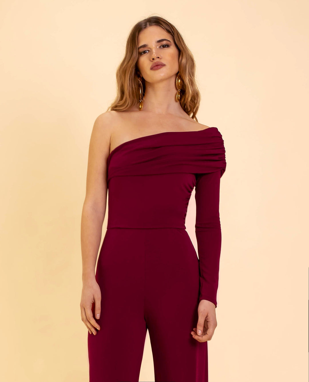 Elegant women's one-shoulder jumpsuit. Flattering fit, perfect for formal eveningwear and special occasions.