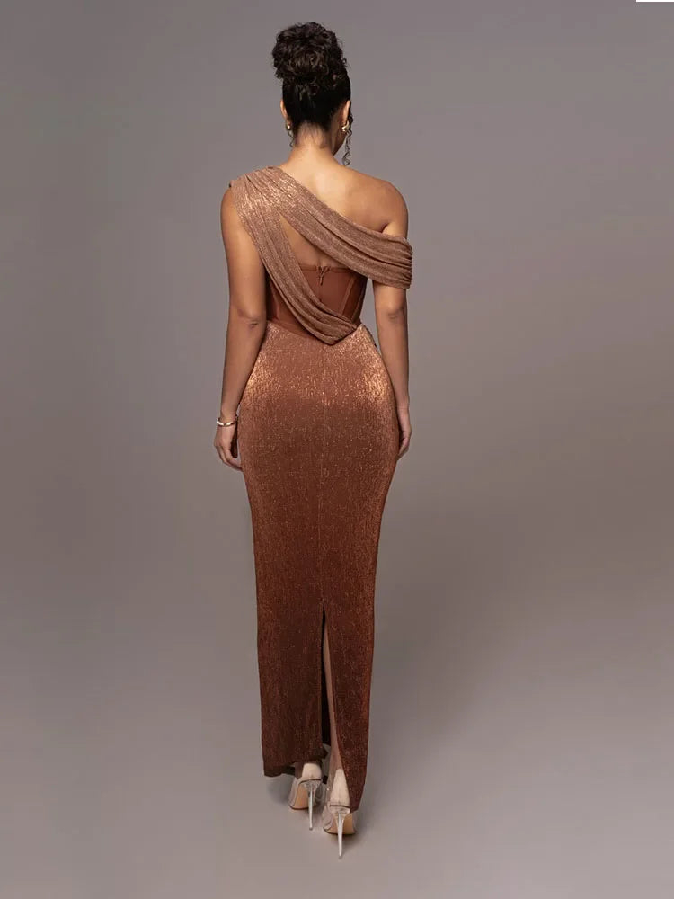 Stunning women's one-shoulder formal maxi gown. Elegant statement dress for parties and special occasions.
