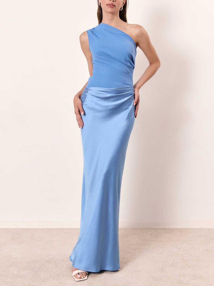 Women's bias-cut one shoulder maxi dress featuring a chic ruched waist, elegant and floor-length for formal occasions.