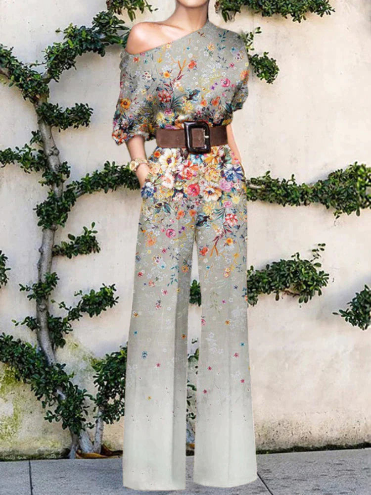 Stylish women's printed one-shoulder wide-leg jumpsuit, an elegant choice for resort wear and parties.