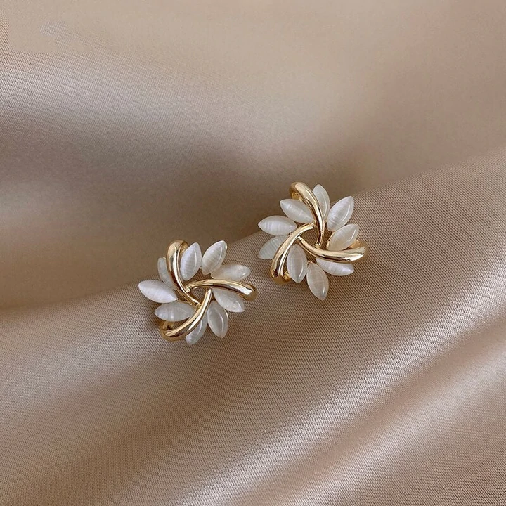 Elegant women's opal petal stud earrings, delicate floral design jewelry.