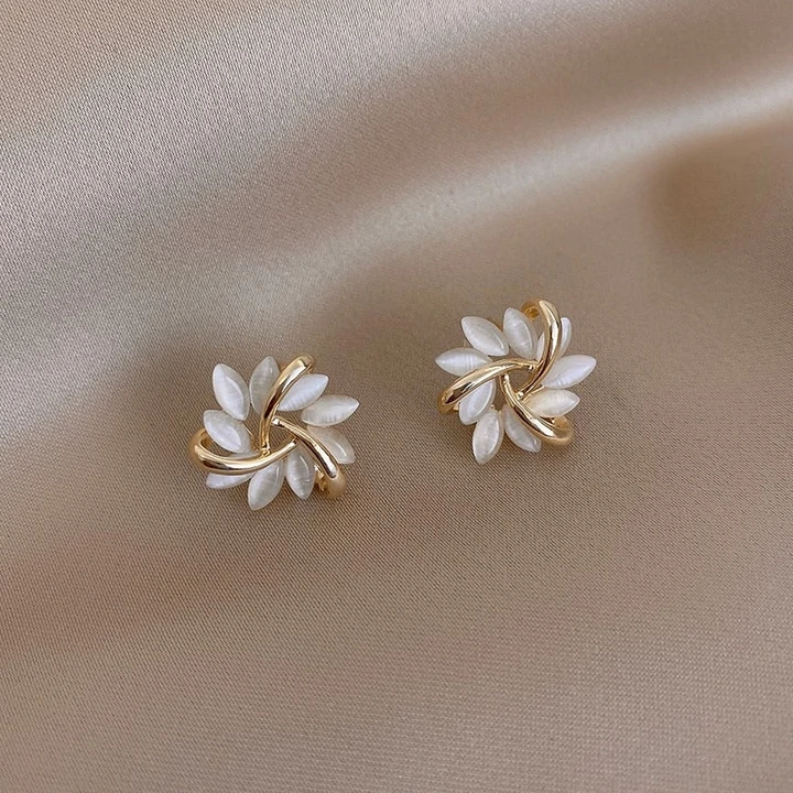 Gift-ready elegant opal petal stud earrings, showcasing a delicate floral pattern.