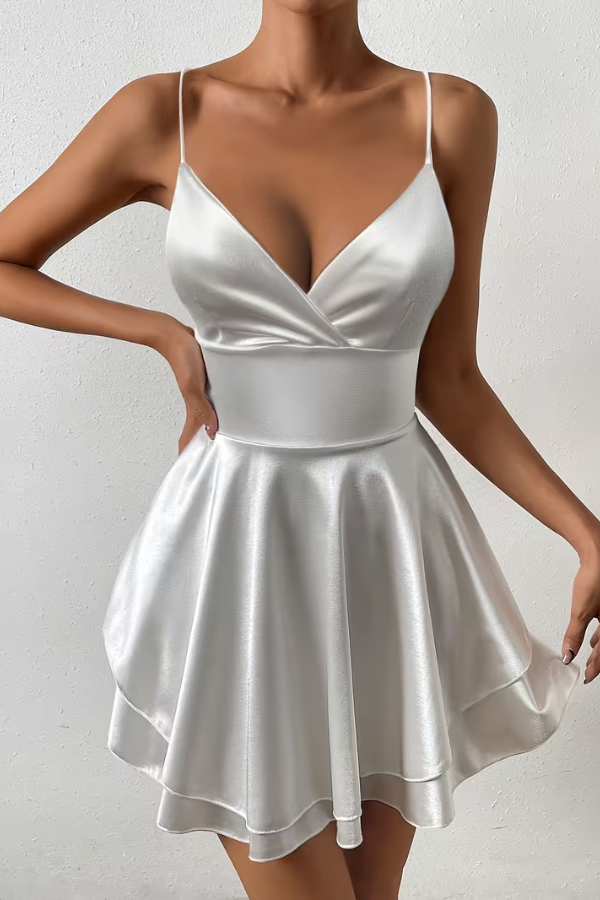 Elegant women's open back swing dress, v-neck, pleated skirt. Perfect for parties & cocktails.