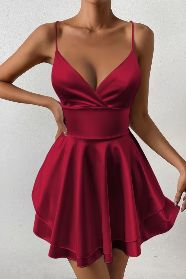Versatile women's open back swing dress with v-neck and pleated skirt. Great for elegant occasions.
