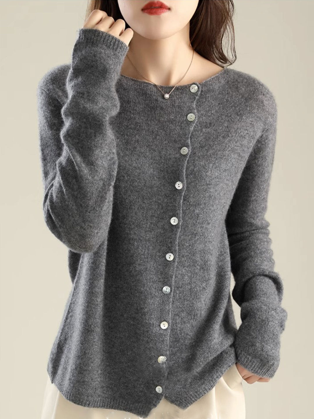 Soft knit women's open-front cardigan. Cozy long-sleeve elegant sweater for comfortable wear.