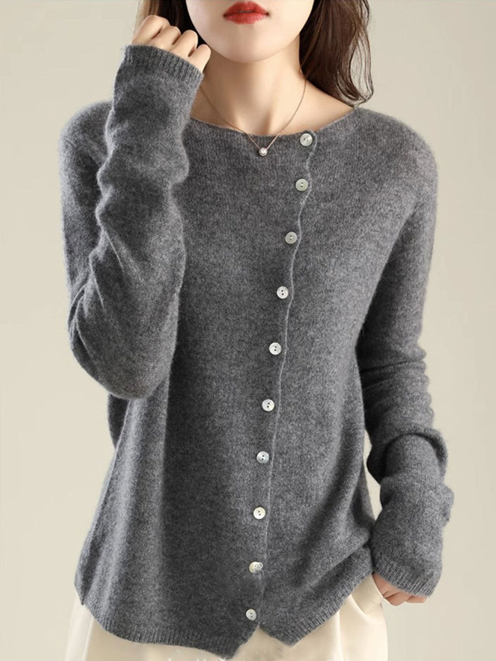 Soft knit women's open-front cardigan. Cozy long-sleeve elegant sweater for comfortable wear.