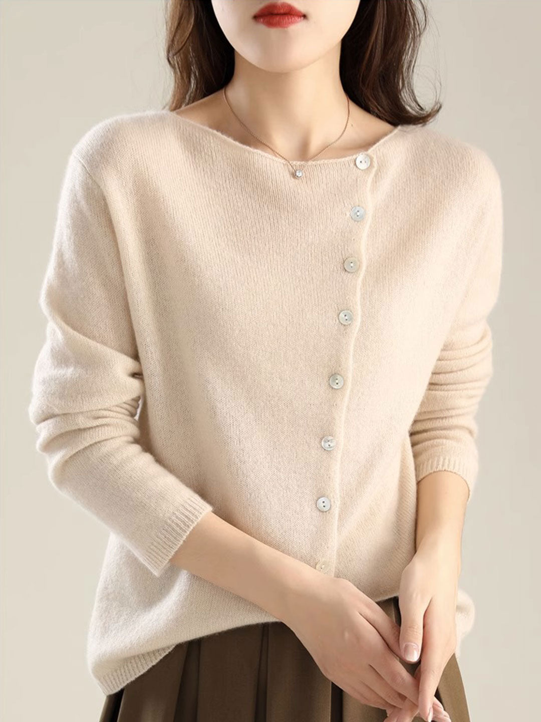 Women's elegant open-front knit cardigan. Cozy long-sleeve sweater for chic layering and comfort.