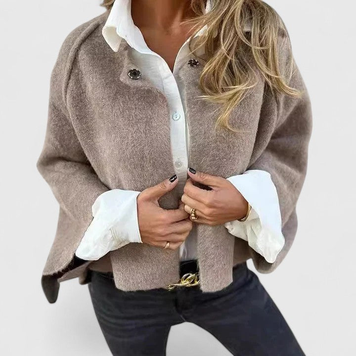 Elegant women's open front jacket, perfect for sophisticated layering or casual chic style.