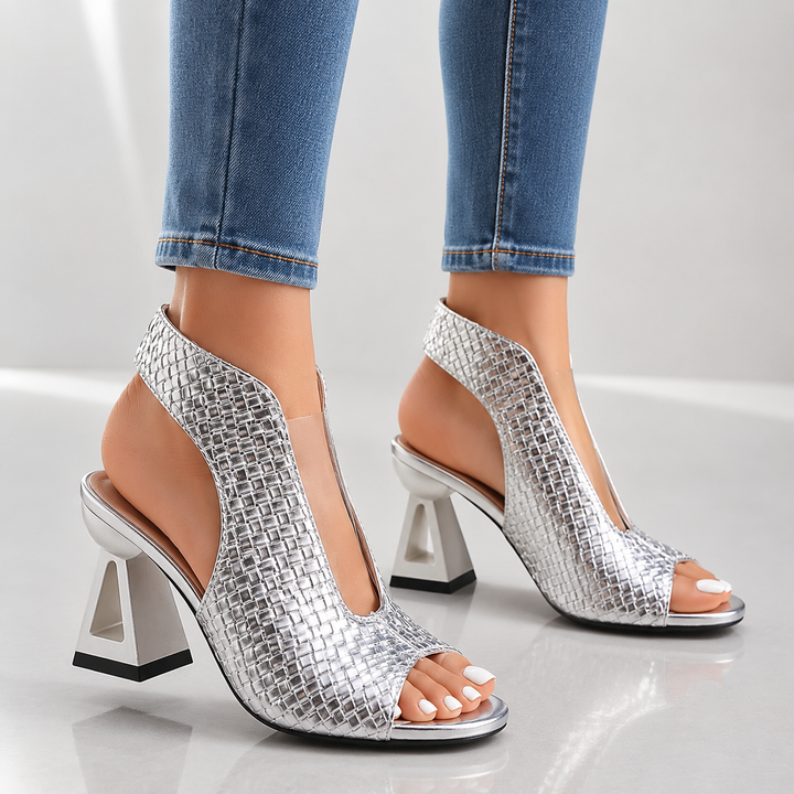 Elegant women's party shoes: open-toe heels with a unique pattern, geometric heel, and slingback strap.