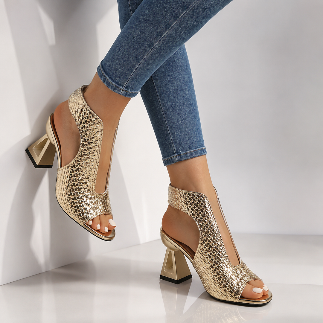 Women's elegant patterned open-toe dress shoes with a distinctive geometric heel and comfortable slingback.