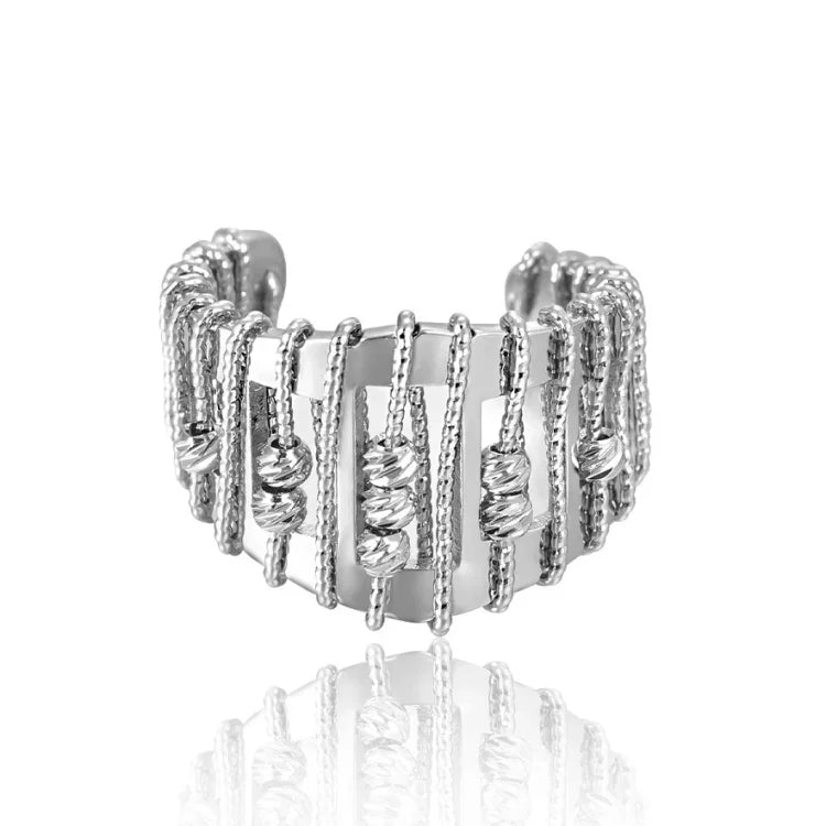 Elegant women's openwork pearl ring with sparkling gemstones. Stylish silver fashion jewelry, perfect statement piece.