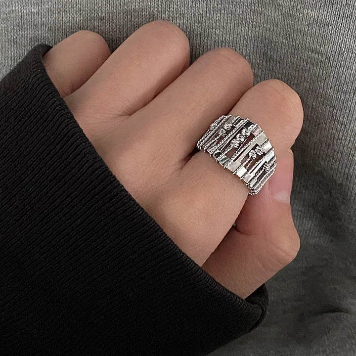 Stylish openwork silver ring for women, featuring a luminous pearl & dazzling gemstones. Fashion-forward elegant jewelry.