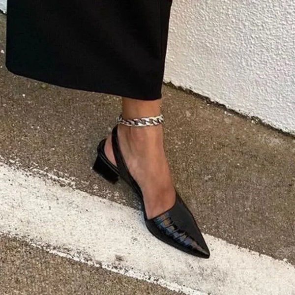 Stylish black orthopedic pumps for women, offering arch support & foot pain relief. Perfect comfortable heels for wellness.