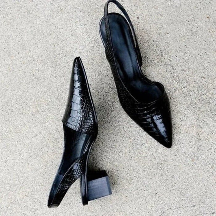 Black women's orthopedic pumps, sleek design, offering superior arch support & comfort for all-day foot pain relief.
