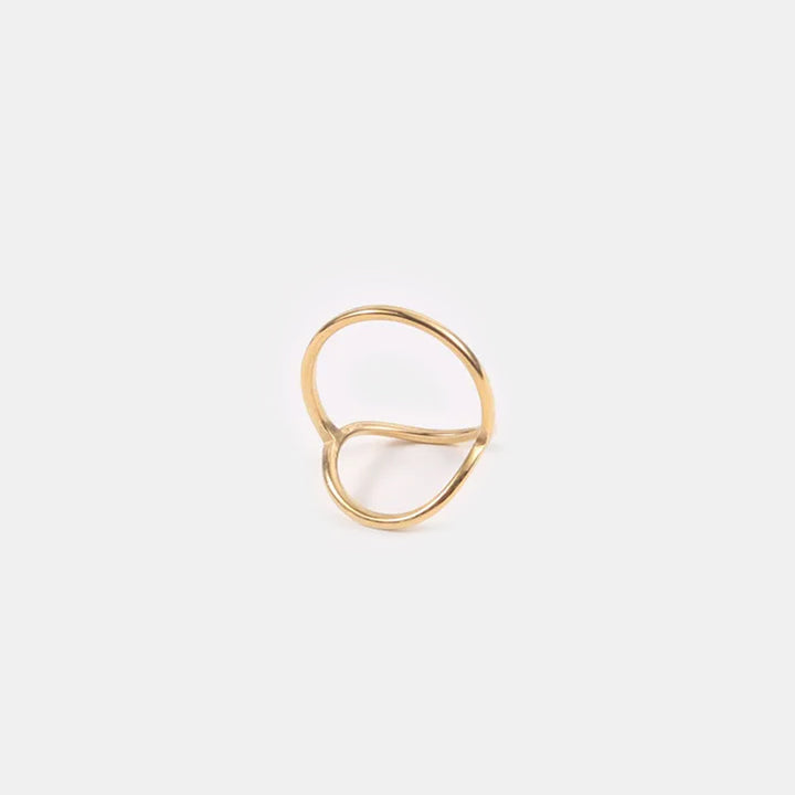 Chic minimalist women's oval ring, a gold fashion accessory for subtle elegance.