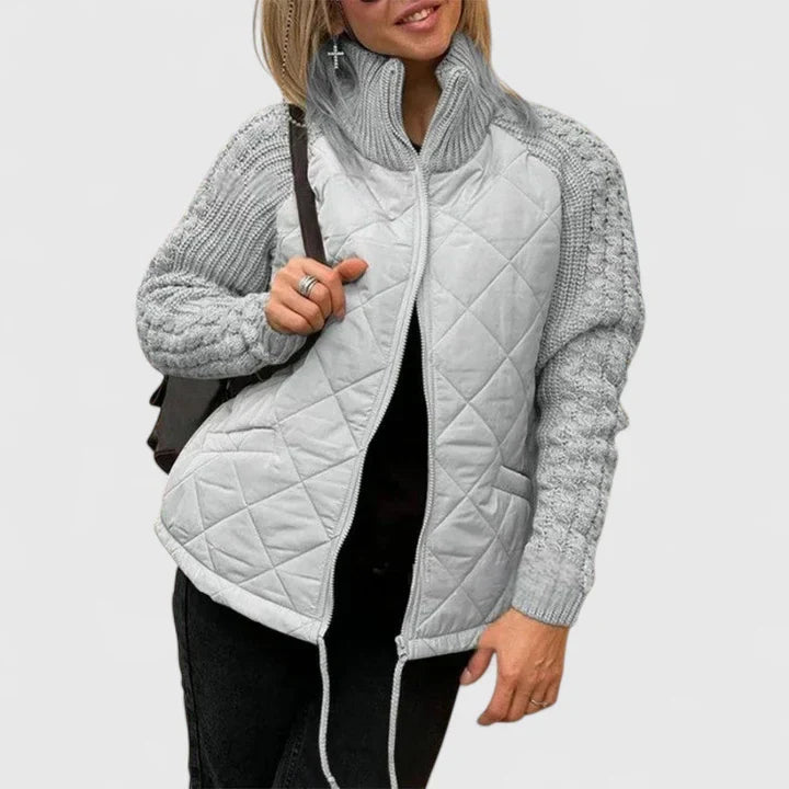 Elegant women's patchwork jacket. Stylish fall/winter outerwear featuring a modern design, perfect for a layered look.