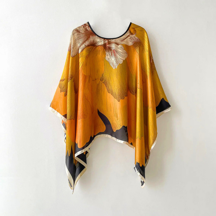 Elegant women's patterned shawl. Stylish accessory, perfect for spring/summer fashion & chic layering.