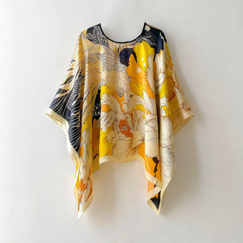 Versatile patterned women's shawl, ideal for spring fashion, summer style & resort wear. Soft touch wrap.