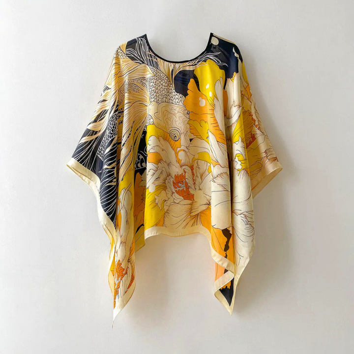 Versatile patterned women's shawl, ideal for spring fashion, summer style & resort wear. Soft touch wrap.