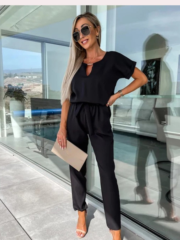 Get ready for spring/summer with this chic women's Patty jumpsuit. Elegant wide leg, V-neck, formal or casual.
