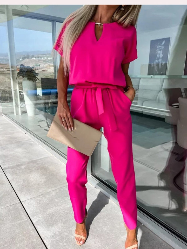Chic women's Patty jumpsuit featuring a stylish wide leg and V-neck, perfect for spring & summer fashion.
