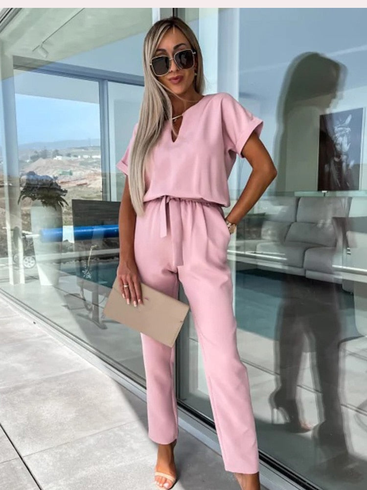 Women's elegant Patty jumpsuit, ideal party outfit. Features a flattering V-neck, wide leg & comfortable fit.