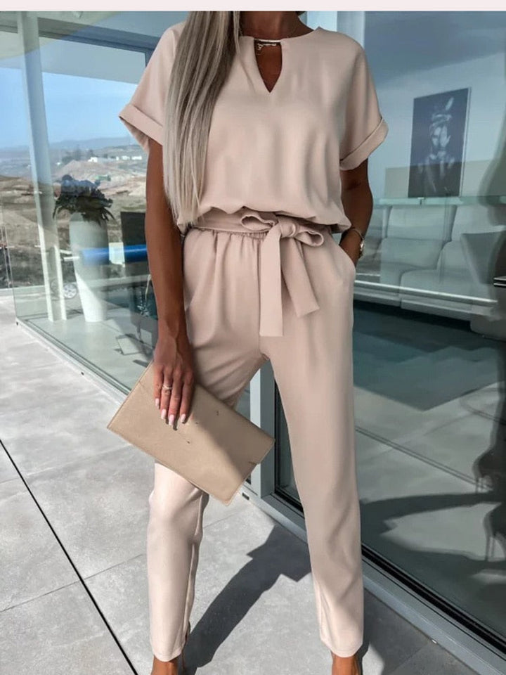 Modern women's Patty jumpsuit with elegant wide leg & V-neck silhouette. A stylish and comfortable fashion choice.