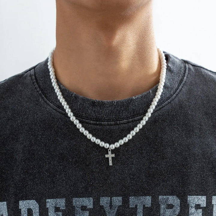 Elegant women's pearl cross necklace with an adjustable chain, perfect for any occasion.