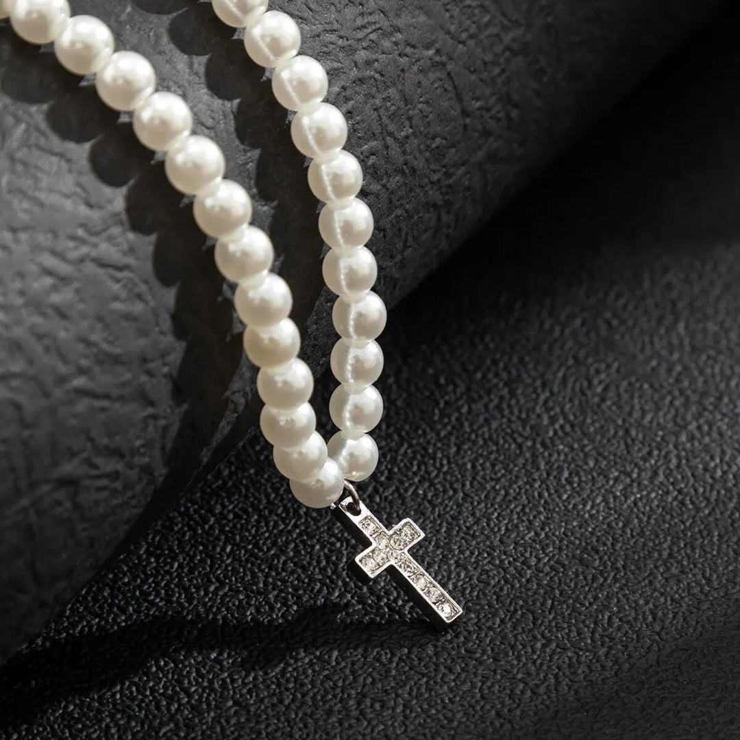 Minimalist elegant pearl cross pendant necklace for women, featuring real pearls & adjustable chain.