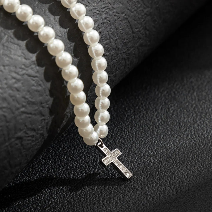 Minimalist elegant pearl cross pendant necklace for women, featuring real pearls & adjustable chain.