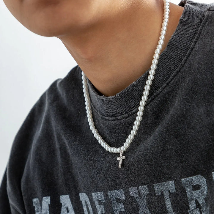 Women's elegant pearl cross necklace, a versatile accessory with an adjustable chain for daily wear.