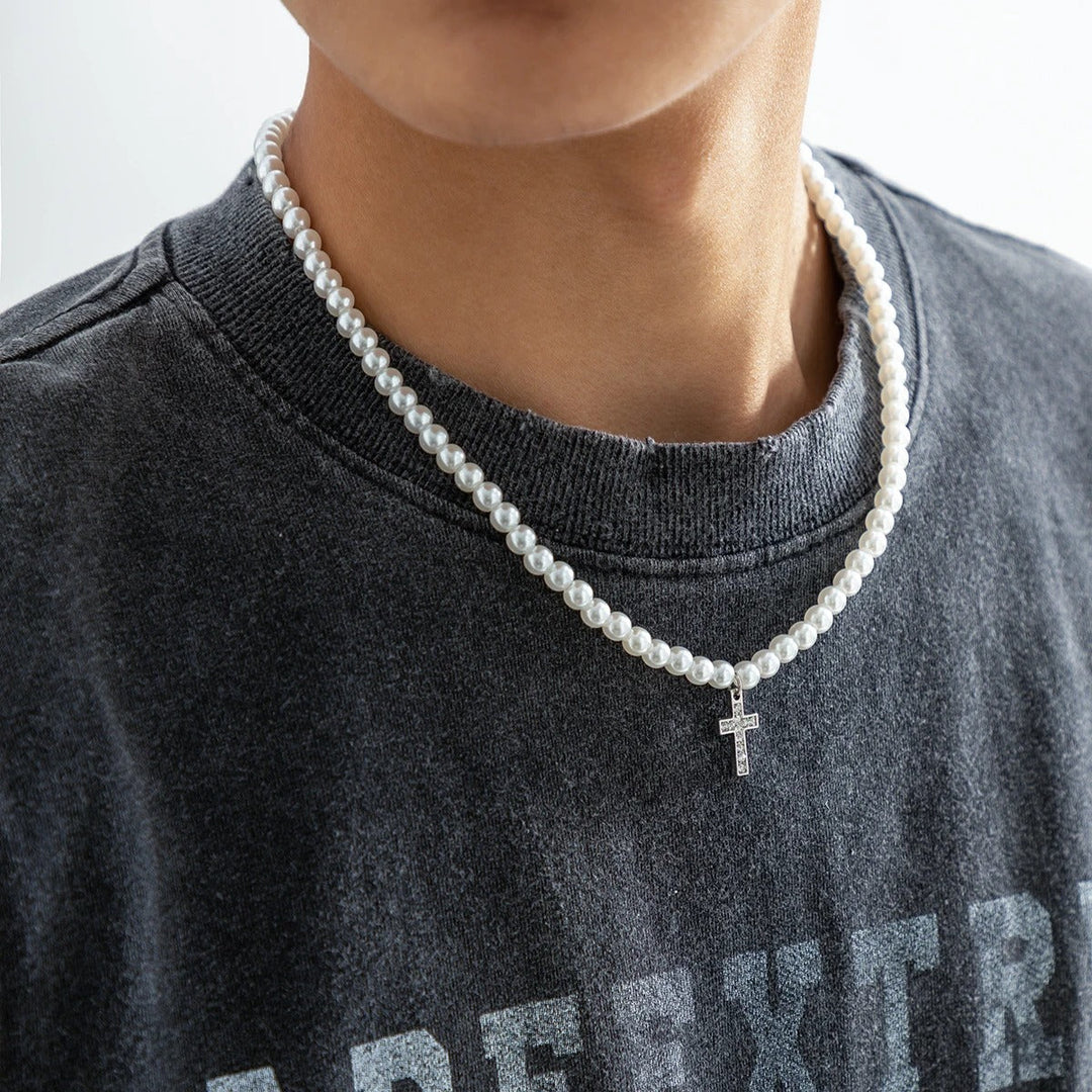 Stunning women's pearl cross pendant necklace with an adjustable chain, an elegant statement jewelry piece.