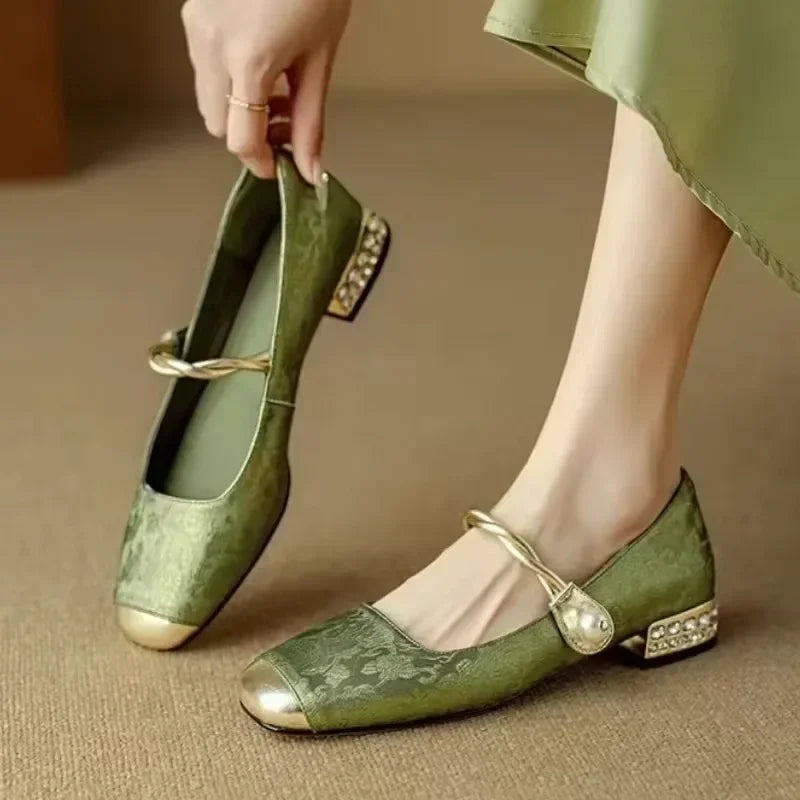 Stylish black women's pearl flats, ideal for office, daily & elegant dress wear.