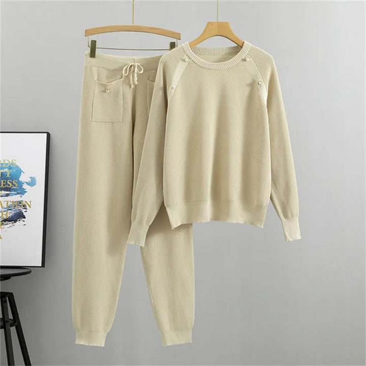 Comfortable pearl knit two-piece lounge set for women. Relaxed fit top & pants, ideal for casual wear.
