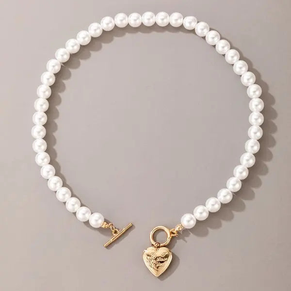 Timeless Elegance in Flight women's pearl necklace, a classic fashion accessory with secure lobster clasp.