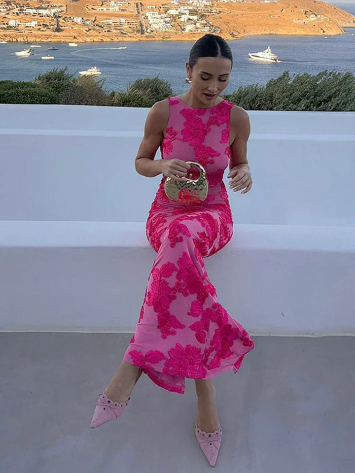 Sleek pink floral high-neck fitted maxi dress for women, elegant choice for wedding guests & cocktail parties.