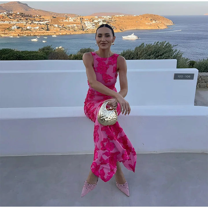 Stunning women's high-neck pink floral maxi dress, an elegant wedding guest or special occasion evening gown.