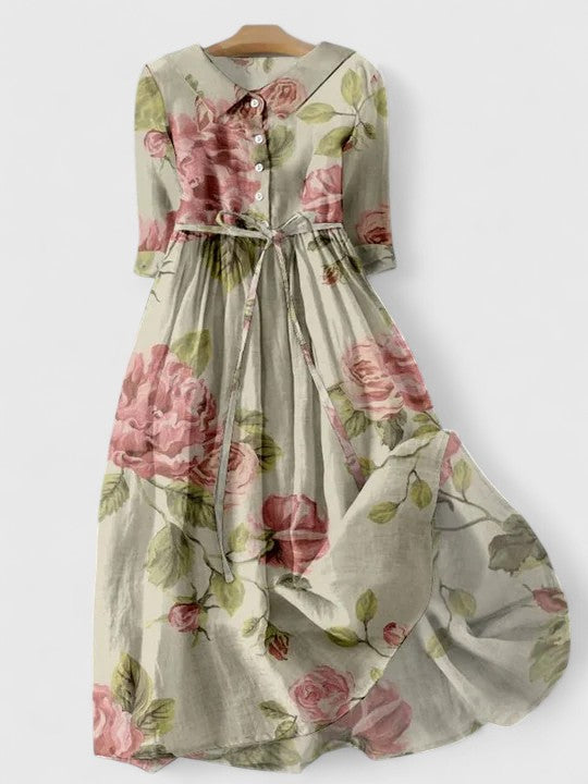 Elegant women's pink floral lace-up spring midi dress, timeless style, perfect for comfortable everyday wear.