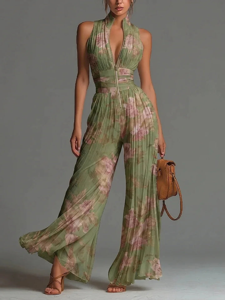 Elegant women's pleated floral halter neck wide-leg jumpsuit, perfect for summer parties or vacations.