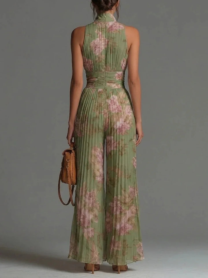 Chic women's floral halter neck jumpsuit with elegant pleats, ideal for parties, evening wear, or special occasions.
