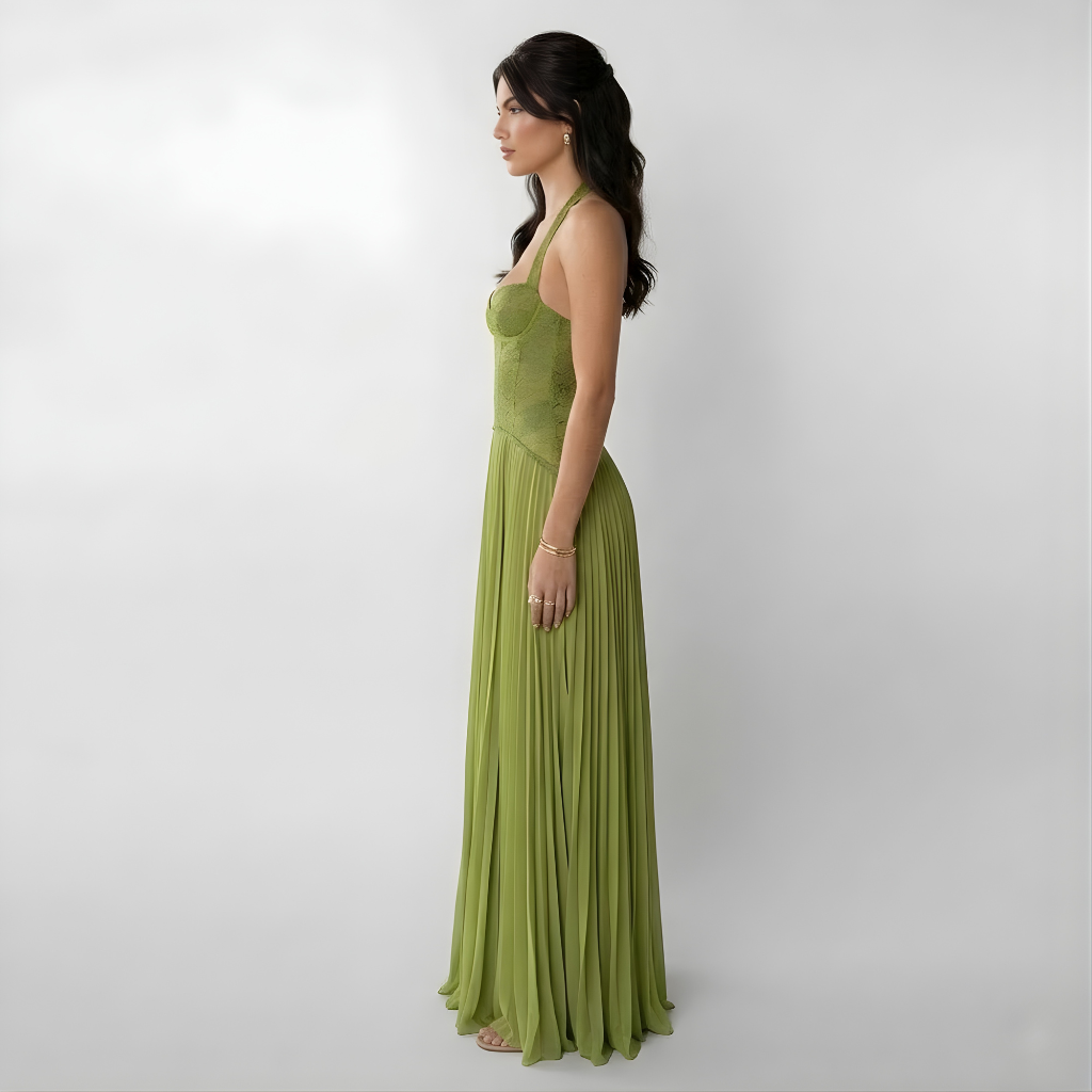 Stunning green pleated halter maxi dress for women, featuring an alluring open back. Ideal for parties & vacations.